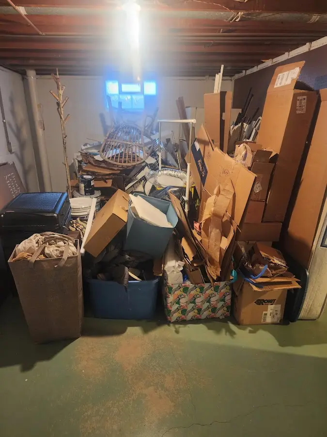 Roll-off dumpster container at job site for 8 Yard Dumpster Rental in Brooklyn Park